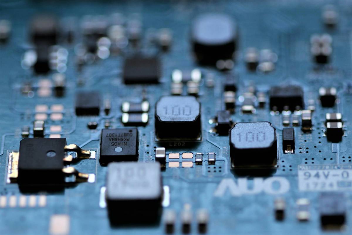 Embedded system hardware design showing proper decoupling capacitor placement near microcontroller pins